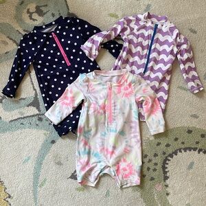 6-12 month girls swim suits rash guards, 2 from Gap, 1 from primary - like new
